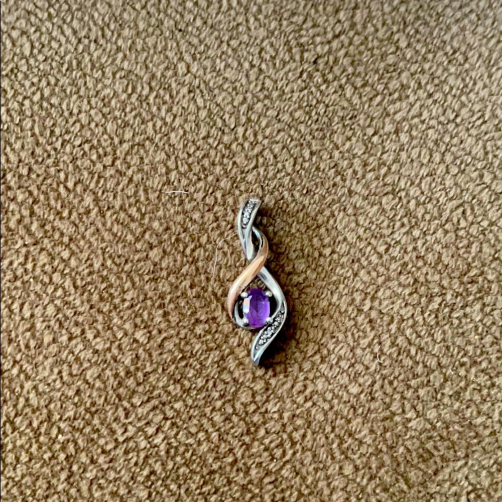 Charm for a necklace